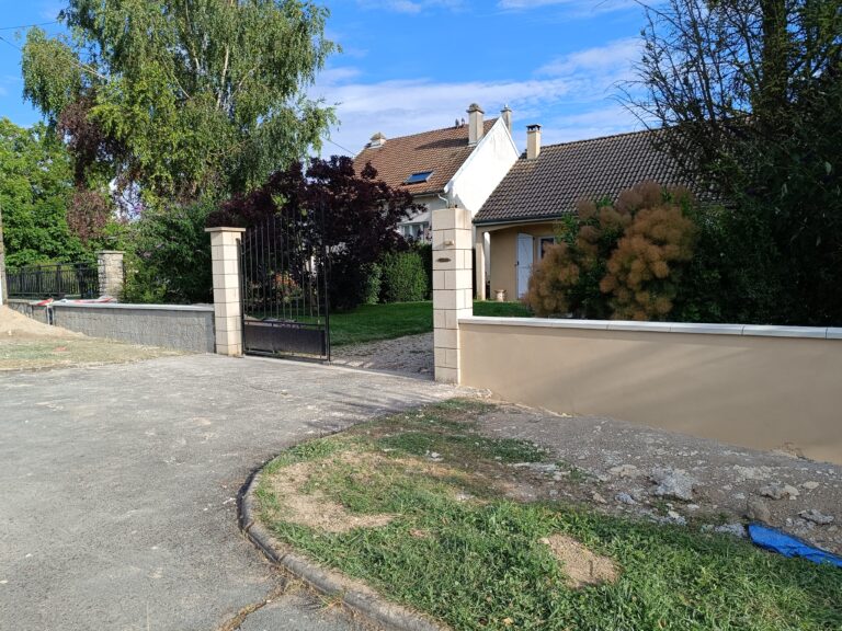 Création d'un muret et d'une clôture par creavert51