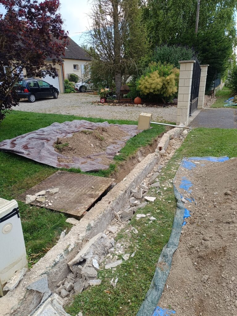 Création d'un muret et d'une clôture par creavert51