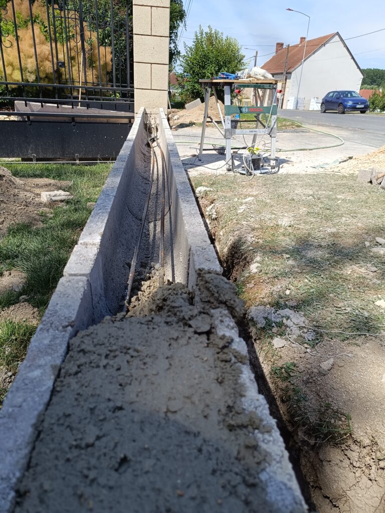 Création d'un muret et d'une clôture par creavert51